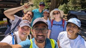 Kaustubha Eluri and a group of Silicon Valley campus students and staff posing in a group in hiking attire