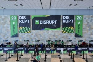 An image from above of a giant row of check in lanes at the entrance to TechCrunch Disrupt