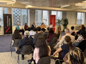 Mehrdad Aliasgari speaks during the panel discussion as Caroline Simard, Mary Murphy, Dave Cortese, and Dawn Carter listen along with the audience