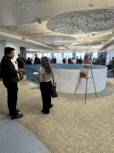 After the panel, audience members chat over breakfast