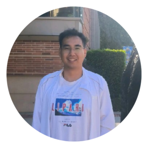 A photograph of Zhiping Li standing outside wearing a white shirt