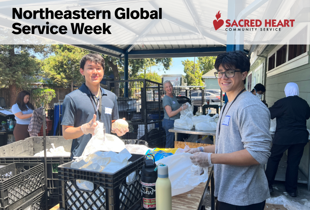 Photo of students packing groceries during a previous volunteer day at Sacred Heart